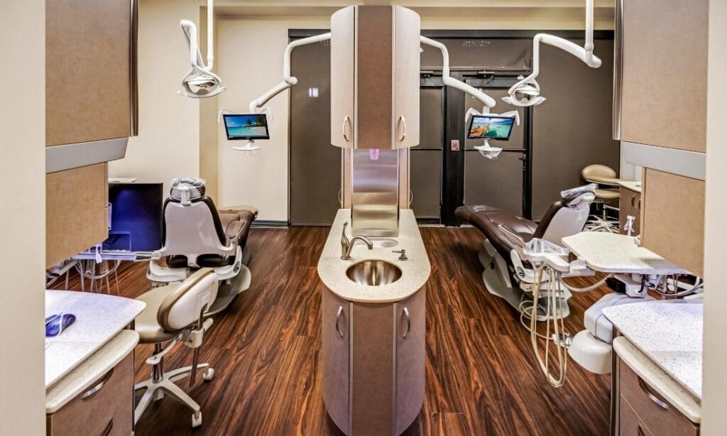 patient-rooms Modern dental treatment room with IsoDry technology designed for patient comfort and efficient care